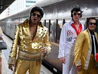 Elvis fans arrive at Central station before boarding a train to The Parkes Elvis Festival, in Sydney on January 10, 2019. The Parkes Elvis Festival is an annual event celebrating the music and life of Elvis Presley in the New South Wales town of Parkes.
PETER PARKS / AFP