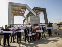 Palestinians protest against the closure of the Rafah crossing point between Egypt and the southern Gaza Strip and the Israeli blockade on the territory, on January 24, 2019 in Rafah. 
SAID KHATIB / AFP