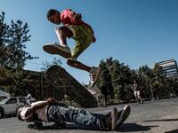 A skateboarder performs on a street in Addis Ababa on February 3, 2019 during the third Car Free Day promoted by local NGOs and the Ethiopian Government to appeal a healthy life style and a less air pollution of the capital city. 
EDUARDO SOTERAS / AFP