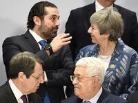 Lebanese Prime Minister Saad Hariri (up-L) speaks with British Prime Minister Theresa May (up-R) above Cyprus President Nicos Anastasiades (down-L) speaking with Palestinian President Mahmud Abbas during the first joint European Union and Arab League summit.
Khaled DESOUKI / AFP