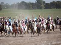 This photograph taken on March 27, 2019, shows Pakistani horse riders during an attempt for a Guinness World Record for tent pegging in Khanewal district in Punjab province.
SS MIRZA / AFP
