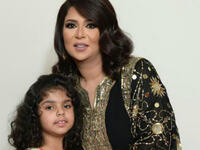 Nawal Al Kuwaitiyeh chose a Abaya from HAMSA By Sharifa Al Ghanim for her TV appearance in the show