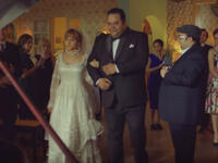 Egyptian Russian Actress Nelly Karim slipped into a wedding dress that suits the sixties which is the era 