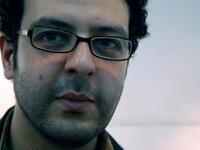 Artsy poster boy: Ahmad Bassiouny 32 year-old father of two was found at a hospital, choked with gas and with rubber bullet wounds with fractures all over. An assistant professor of Art at Helwan Uni, was seized as he videoed 
protests in January, and died January 28th before Mubarak's ousting.

