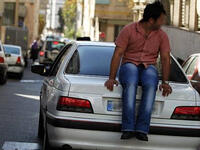In Tehran, local authorities restrict the number of cars allowed on the road according to their license plates (even numbers are allowed one day, odd the next). Drivers have found a quirky solution: hire people to sit and walk behind their cars to cover the plate. Why not just tape over the numbers like they do in China?