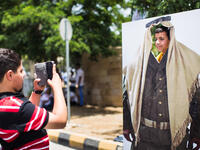 Ever wanted to be a bedouin soldier holding a rifle? These face cut-outs were a hit, with kids and adults posing for pictures as soldiers in uniform, or as a family in traditional clothing. 