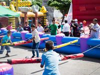 Sadly, only kids were allowed to play in the huge play area complete with bouncy castles, human foosball, and bubble soccer.