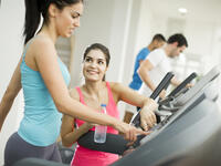 women working out treadmill
