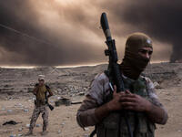 Iraqi forces take part in an operation against Daesh militants to retake Mosul on October 19, 2016.