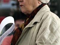 A woman waits to cast her ballot at a polling station in Chisinau. Moldova voted in a parliamentary election that aims to end a prolonged power vacuum in Europe&amp;#039;s poorest country as it seeks to establish EU membership and sustainable growth.