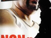 A woman walk past an election posters of the right-wing Swiss People's Party (SVP-UDC) reading "Ivan S. rapist and soon to be Swiss?" in Geneva.