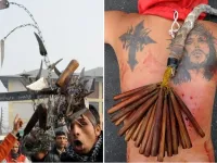 Some Shia men emulate the suffering of Hussein by flagellating themselves with chains or cutting their foreheads with
their palms until blood streams. This can turn quite extreme & frenzied as can get competitive 
& riled up. Not so dissimilar to some devoted Christians at Easter, who self-inflict physical suffering in remembrance of Jesus.