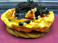 Zillion-dollar lobster frittata - $1,500
The frittata consists of six eggs, a splash of cream and some chopped chives. Oh yeah, there's also an entire lobster and 10 ounces of caviar (Twitter)