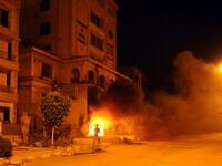 Things get heated as protestors set fire to the Muslim Brotherhood HQ (AFP)