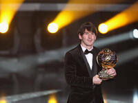 Lionel Messi of Argentina and Barcelona FC receives the men's player of the year award during the FIFA Ballon d'or Gala at the Zurich Kongresshaus in Zurich, Switzerland.