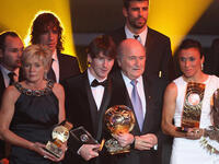 Silvia Neid (L) of Germany winner of women's coach of the year, Lionel Messi (2nd L) of Argentina winner of the men's player of the year,FIFA President Sepp Blatter (2nd R) and Marta (R) of Brazil winner of the women's player of the year.