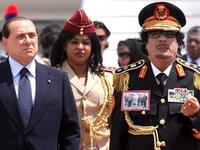 الست اللي ورا معمر القذافي، في تعليق ساخر:  "غالباً دى إللى كان يقصدها بكلامه عن دعوته لتحرير المرأة، سواء كانت ذكرا أم أنثى".