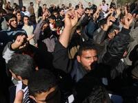 Islamic Jihad supporters protest as they mark the second anniversary of Israel's three-week offensive on the Gaza Strip.