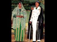 Husband and Wife pose for a Kodak moment, costumed out as always in readiness for the family album. Wife Safia was
last said to be in hiding with three of her children in Algeria.
