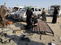 People gather on the site of an explosion.
