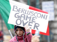 By Valentines Day Italy famed for it’s romance, was following the Arab masses in saying enough is enough and using banners to give the hint to their controversial leader: It seems they want rid of him—not much love for their leader this Valentines Day.