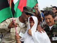 Libyans celebrate following the official of liberation for the country with shows of warmth and unity taking hold of a nation that has been through a very tough and traumatic period. The future's bright, the future's blessed and Islamic, promises the key note speech by Mustafa 
Abdul Jalil, the interim Libyan ruler.