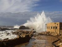 Waves smash into breakers protecting the Roman-era port of Caesarea after a massive storm battering the eastern Mediterranean destroyed the breakers threatening to wash away the historic site, Israeli officials said.