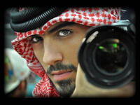 Picture perfect: Omar shows us he looks just as good behind the lens as he does in front of it