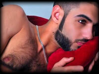 You Mecca me hot: Omar strips off and gives us a peak at his pecs
