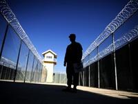 A photo shows a US captain silhouetted at the Bagram prison, north of Kabul, during a media tour. leaked American diplomatic cables revealed that Afghan President Hamid Karzai has ordered the release of numerous dangerous criminals and drug traffickers detained by US-led coalition forces. 