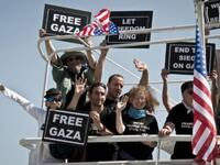 Still smiling, activists after 8/10 boats intercepted 2 weeks on from the sunny start. 2 remaining boats of aspiring
sea-farers, French ship the 'Dignity El Karameh' and the Swedish-Norwegian-Greek 'Juliano' still struggle, docked in the
Greek grip.