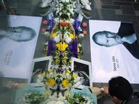 A scene capturing the Chinese emotional and heightened reaction: His mass following saw global aficionados, from China to the UAE - including Dubai that today has become a 'Mecca' to the Apple products. 