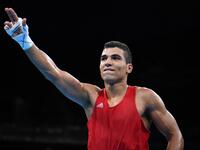 الملاكم المغربي محمد ربيعي: برونزية وزن 69 كيلوغرام.