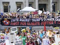 Protesters against the UK visit of US President Donald Trump gather in Trafalgar Square after taking part in a march in London on July 13, 2018. (Niklas HALLEN / AFP)