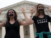 Activists occupy the front steps of the U.S. Supreme Court to protest against the confirmation of Judge Brett Kavanaugh to the Supreme Court October 6, 2018 in Washington, DC. (Alex Wong/Getty Images/AFP)