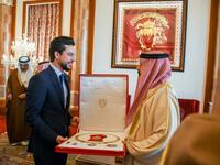 King Hamad bin Isa Al Khalifa of Bahrain bestows the King Hamad Order of the Renaissance 1st class (Wisam al Nahda) on Crown Prince Al Hussein bin Abdullah II.m(Twitter/@RHCJO)