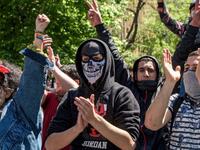 Demonstrators in Armenia march to protest the shift of the former president into the position of prime minister (AFP/File Photo)	