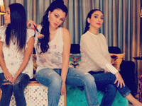 The Lebanese diva and her sisters sported casual looks with denim tight pants