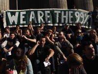 Occupy London's Stock Exchange: headlined the UK's continental effort in a bout of peaceful protest
near St. Paul's this weekend. This assembly of happy campers marked the more familiar British spirit of
Wimbledon-style overnight queuing, as people expressed that this was civil disobedience, not protest. 
A far cry from London's Summer fire. 