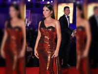 Mona showed up wearing a formal golden bronze dress on Al Gouna Film Festival red carpet 