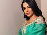 Rahma Riad s elegant dresses have proven her taste in the fashion world