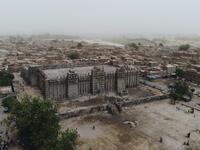 A picture shows the Great Mosque of Djenne in central Mali during its annual rendering ceremony  MICHELE CATTANI / AFP