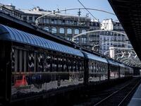 This picture taken on May 13, 2019 shows a restored Orient Express train displayed at the Gare de l'Est train station in Paris.  Christophe ARCHAMBAULT / AFP