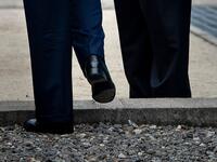 US President Donald Trump steps into North Korea as North Korea's leader Kim Jong-un waits in the Demilitarized Zone (DMZ) on June 30, 2019, in Panmunjom, Korea.  Brendan Smialowski / AFP