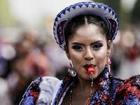 People parade during the Tropical Carnival on July, 7 2019 in Paris.  Kenzo TRIBOUILLARD / AFP