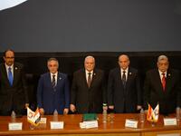 Members of the National Elections Commission (NEC) pose for a picture during a press conference in the Egyptian capital Cairo on April 23, 2019 to announce the result of the referendum extending the rule of President Abdel Fattah al-Sisi. Egypt referendum extending Sisi rule passed with 88.83% of vote. MOHAMED EL-SHAHED / AFP