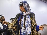 Sunlight floods into a brand new library at the cultural centre where books line shelves along a wall that still smells of wet paint. DELIL SOULEIMAN / AFP