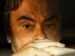  Former Nissan Motor Chairman Carlos Ghosn sits inside a car as he leaves his lawyer's office after being released on bail from Tokyo Detention House, in Tokyo, Japan on March 6, 2019. He was subsequently detained again.