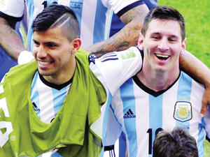 صورة أرشيفية لميسي وأغويرو