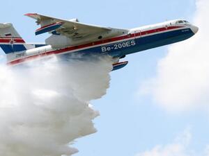 A Russian Beriev BE 200 amphibious aircraft performs a demonstration flight on the opening day of the 54th International Paris Air Show at Le Bourget.